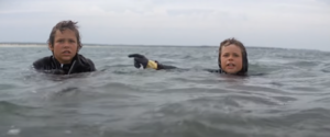 Image of two boys in the water